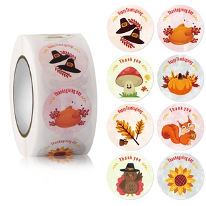 Roll of Thanksgiving stickers featuring pumpkins and turkeys with Happy Thanksgiving text