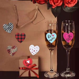 Valentine heart stickers set with assorted patterns on gift boxes and champagne glasses