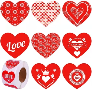 Roll of heart-shaped Valentine's Day LOVE stickers with floral and crown patterns