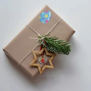 Rustic Easter gift wrap set with striped paper pine sprig and wood angel star tag