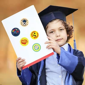 Graduation party stickers set featuring mortarboard and medals on a boy's mortarboard cap