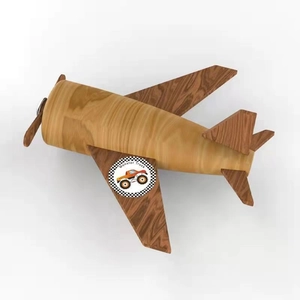 Wooden toy propeller plane with Monster Truck wing stickers on light background