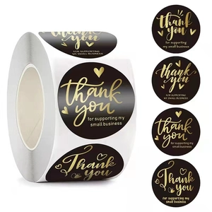 Detail of round black and gold stickers with Thank You For Supporting My Small Business text
