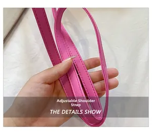 Detail shot of the rose pink adjustable leather strap with fine stitching and soft texture
