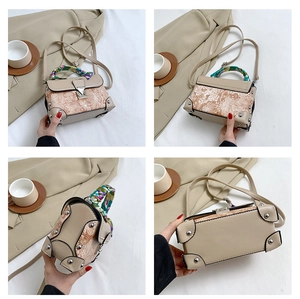 Detailed views of vintage embroidered box bag with silk scarf handle and metal corners