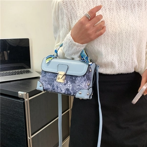 Elegant light blue embroidered box handbag with silk scarf handle and metal clasp