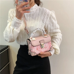 Vintage pink box bag with floral embroidery, scarf handle, and metal studs for women