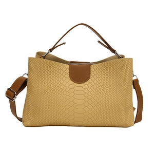 Minimalist bicolor yellow faux snake pattern tote bag with brown leather handles and strap