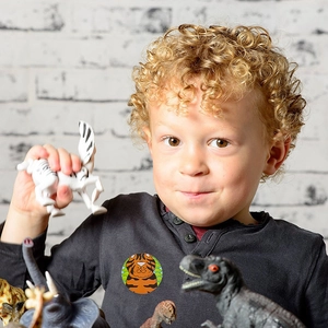 1-inch cute cartoon tiger adhesive label sticker applied on a child's cotton t-shirt