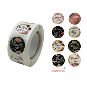 Detail of 1-inch floral thank you stickers showing 8 unique patterns for gift wrapping