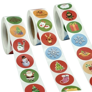 Roll of 25mm Merry Christmas sealing stickers with Santa, reindeer and snowman designs