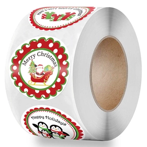 Roll of 500 Merry Christmas stickers with Santa and penguin designs for gift sealing