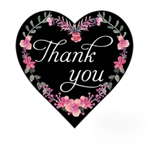 Floral heart-shaped Thank You stickers with pink flowers and green leaves on black background