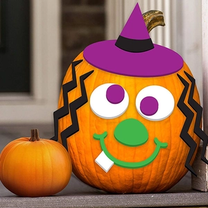 Halloween pumpkin face decorating kit with colorful DIY sticker parts for festive party decor