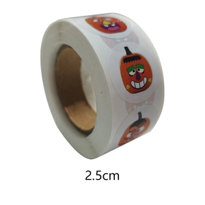 Roll of 2.5cm Halloween pumpkin face stickers for gift packaging and envelope sealing