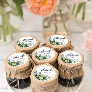 Floral Thank You stickers on glass jar lid with succulents and greenery patterns