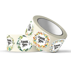Roll of 1-inch round floral Thank You stickers for gift packaging and seal labels