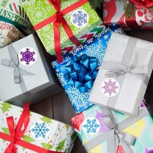 Roll of 8 colorful snowflake Christmas decorative adhesive labels on gift boxes