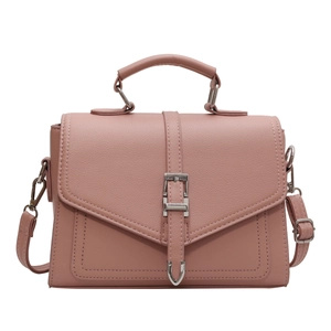 Elegant dusty pink crossbody bag with litchi texture and silver buckle detail