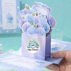 3D pop-up happy birthday card featuring blue hydrangea flowers and a cute cartoon puppy