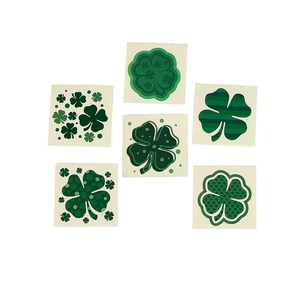 Set of six St. Patrick's Day shamrock temporary tattoos in various green patterns