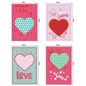 Set of four colorful heart-themed Valentine's Day gift cards in various patterns and designs