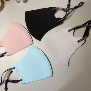 Detail of breathable ice silk face masks in four colors with adjustable ear loops