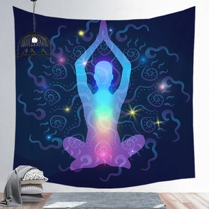 Detail of mandala meditation tapestry with chakra silhouette in a cozy room setting