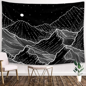 Modern wall hanging decor showing sun and moon mandala tapestry in a cozy living room scene