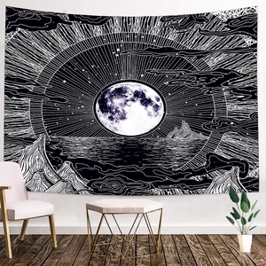 Detail of sun and moon mandala tapestry with celestial stars and mountain art for wall decor