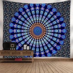Detailed view of bohemian mandala tapestry hanging in a cozy living room setting