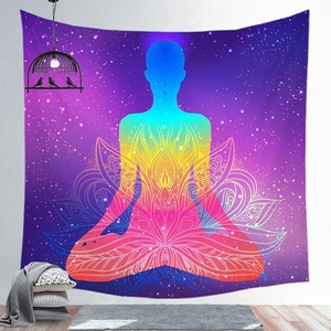 Detailed view of mandala meditation tapestry with chakra colors in a cozy room setting