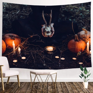Gothic Halloween tapestry detail showing a deer skull, pumpkins, and candles in a dark forest