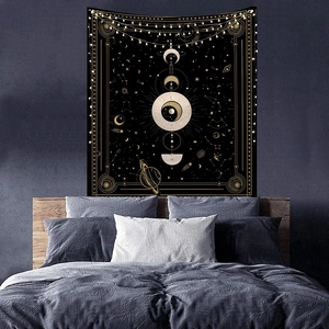 Lunar phase celestial tapestry with skull print and gold astrology patterns on black fabric