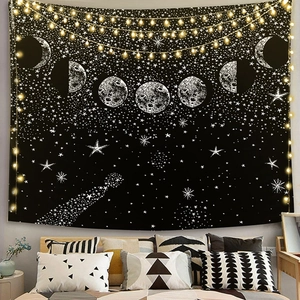 Cozy bedroom setting with lunar eclipse phases tapestry and warm string lights