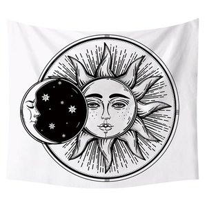 Nordic Tree of Life tapestry featuring bohemian black and white sun and moon patterns