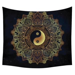 Detail showing the golden mandala sun and moon yin yang patterns on navy tapestry