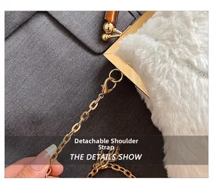 Detail view of the detachable gold chain strap on a white plush faux fur evening clutch bag