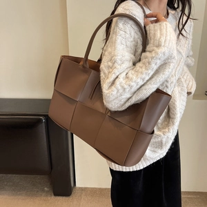 Brown woven leather tote bag with large checker pattern for women daily commute