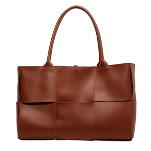 Deep brown large woven tote bag in premium faux leather with minimalist twin handles