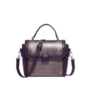 Elegant purple two-tone crossbody bag with smooth faux leather and metallic brushed texture