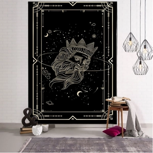 Detail of black and gold tarot tapestry featuring a Poseidon figure and celestial patterns