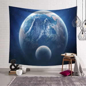 Detailed starry sky tapestry featuring a glowing blue Earth on a white brick wall background