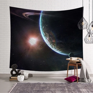 Starry sky tapestry with planets hanging on a white brick wall for room decor