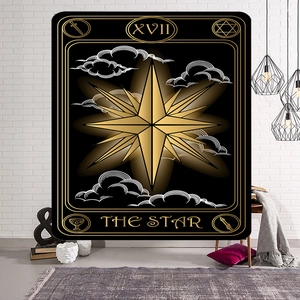 Detail view of The Star XVII Tarot tapestry hanging on a white brick wall in a home setting