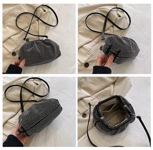 Detailed views of a black rhinestone cloud bag showing metal clasp and internal structure