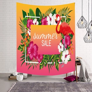 Nordic tropical flamingo wall tapestry with summer sale text on a white brick wall