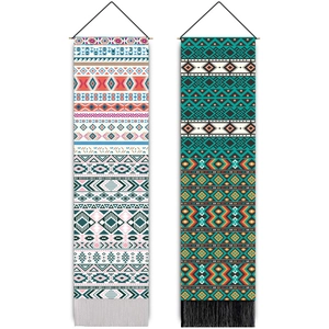Bohemian woven tapestry with geometric patterns and tassels on a wooden rod