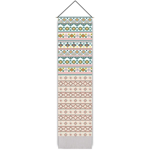 Bohemian style woven wall tapestry with geometric patterns and white fringe tassels