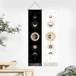 Bohemian sun and moon wall tapestries with golden astrology patterns and tassels